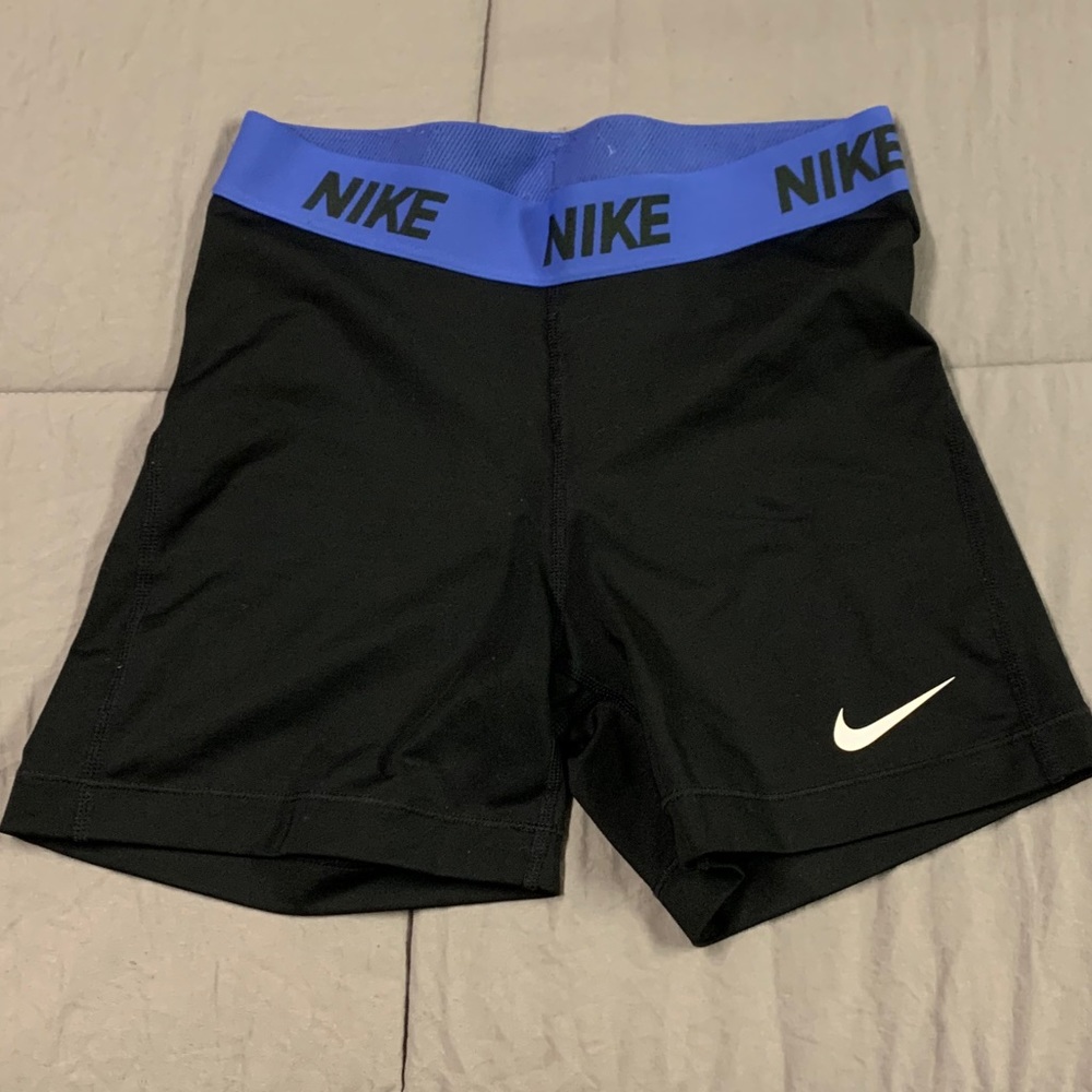 black nike spandex with blue waist band, small